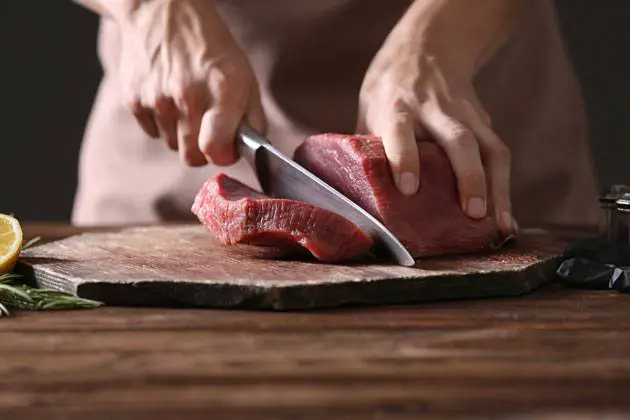 cutting large pieces of meat